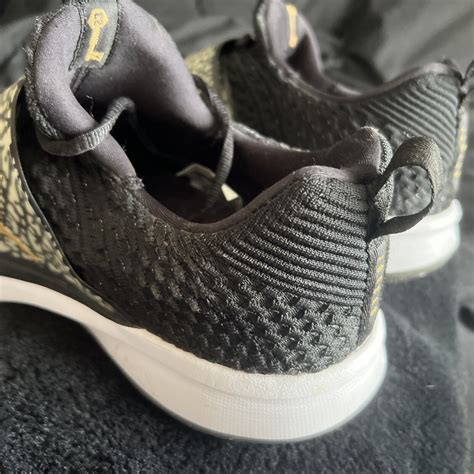 Jordan Trainer 2 Flyknit Black Metallic Gold 